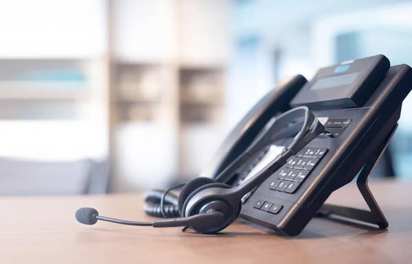 Image of a telephone and headset.