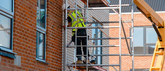 a person working at height on some scaffolding