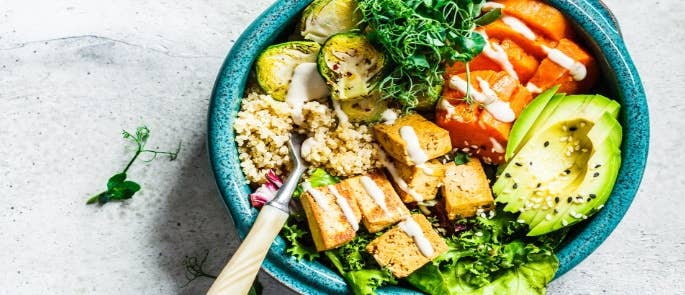 Bowl of salad, tofu and roasted vegetables