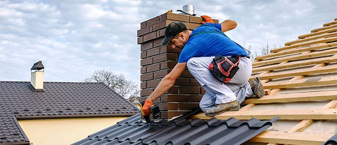 A roofer demonstrating their skills