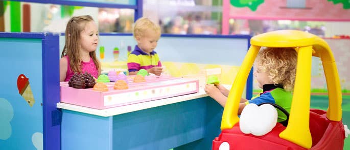 children role playing in an ice cream parolour