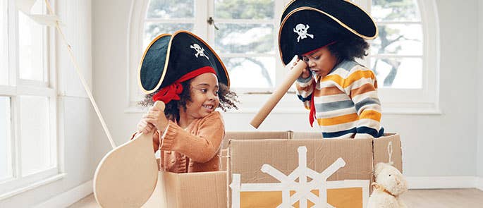 children fantasy role playing as pirates