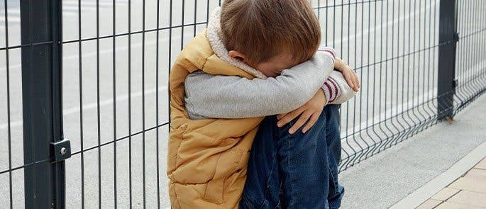 A young child feeling alone