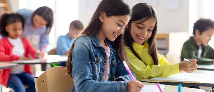 Children socialising in a classroom 