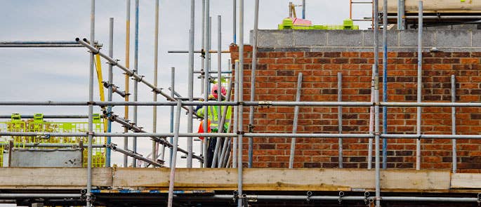 A worker on scaffolding