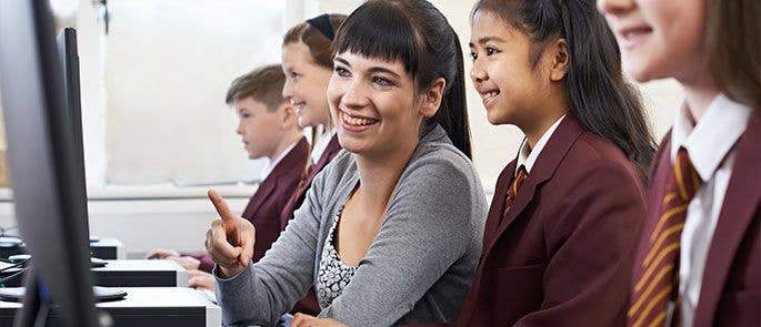 Teacher working with a pupil 