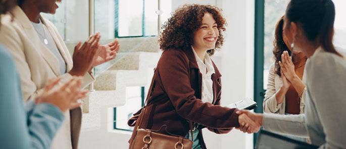 Employees meeting colleagues in the workplace