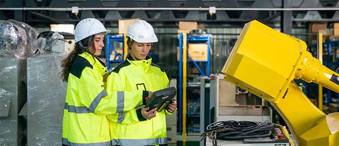 Construction workers checking quality of work