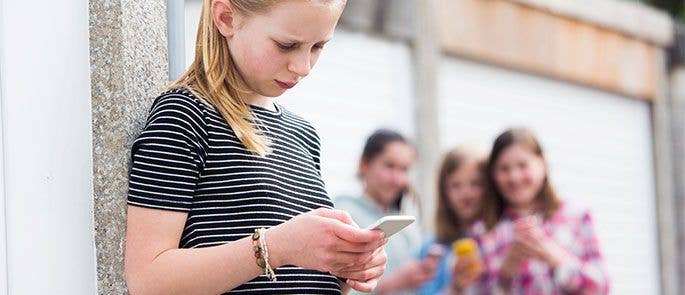 Teenager on her phone