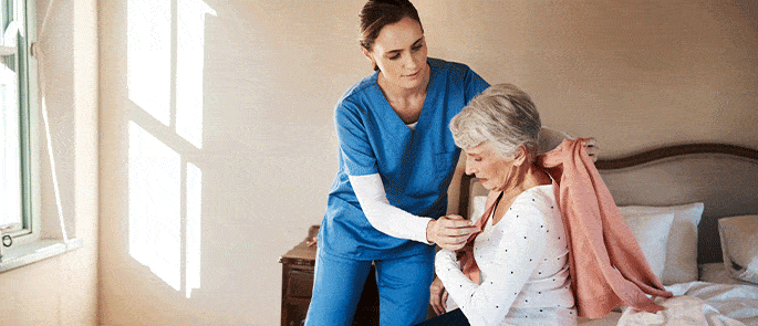 Care worker assisting with personal care 