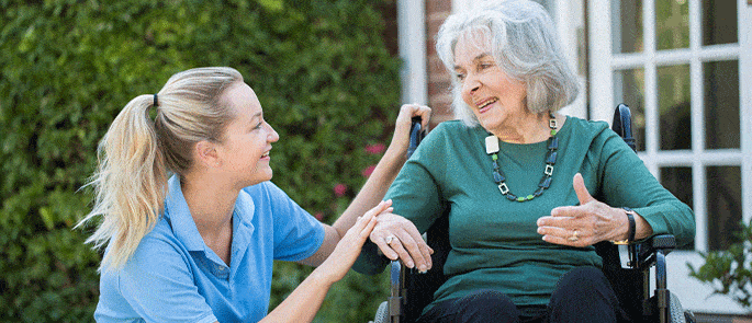 A nurse providing personal care in health and social care setting